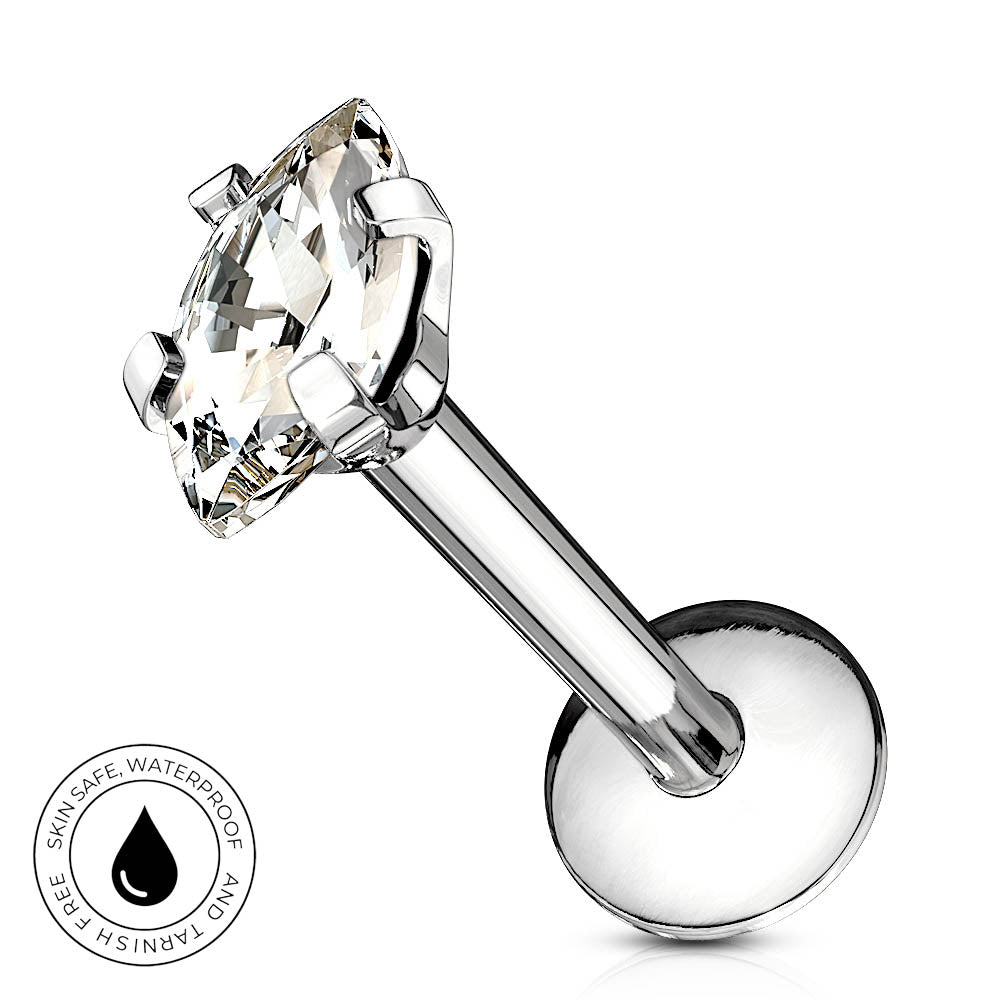 A silver-toned labret piercing stud with a large clear marquise-cut gemstone, shown on a white background with a circular 'Skin Safe Waterproof' badge in the lower-left corner.
