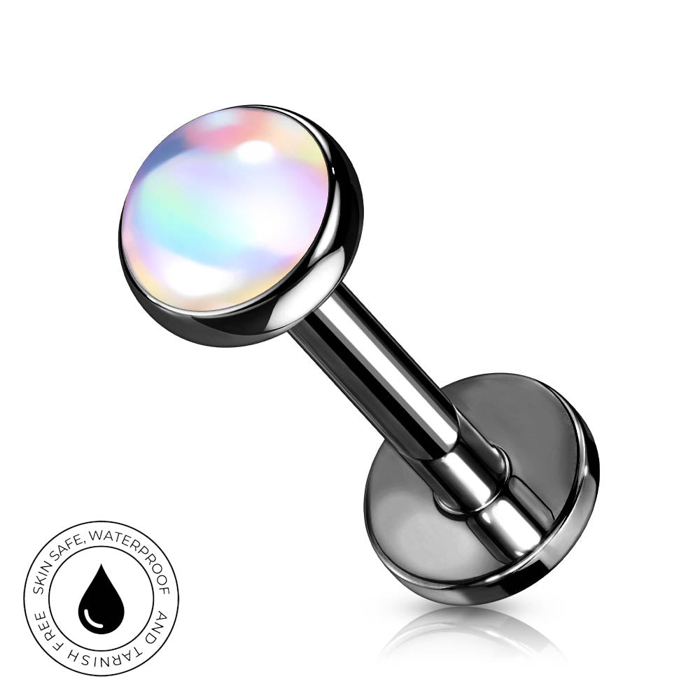 A stainless steel labret piercing barbell with a round, iridescent, skin-safe waterproof top. A circular badge in the bottom-left corner highlights the waterproof and skin-safe features.