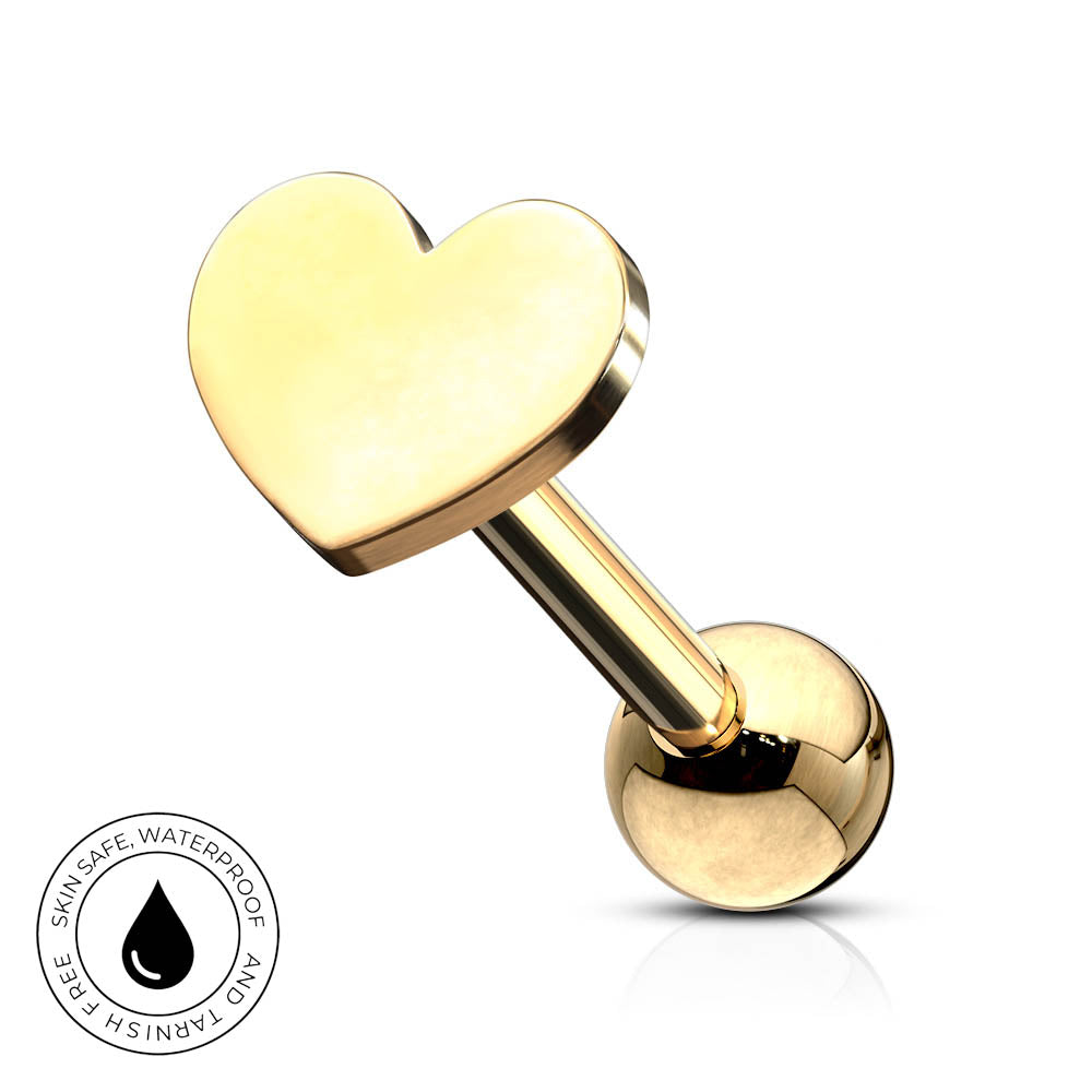 A gold-plated heart-shaped labret piercing stud with a polished ball back, shown on a clean white background with a small circular 'Skin Safe Waterproof' badge in the bottom-left corner.