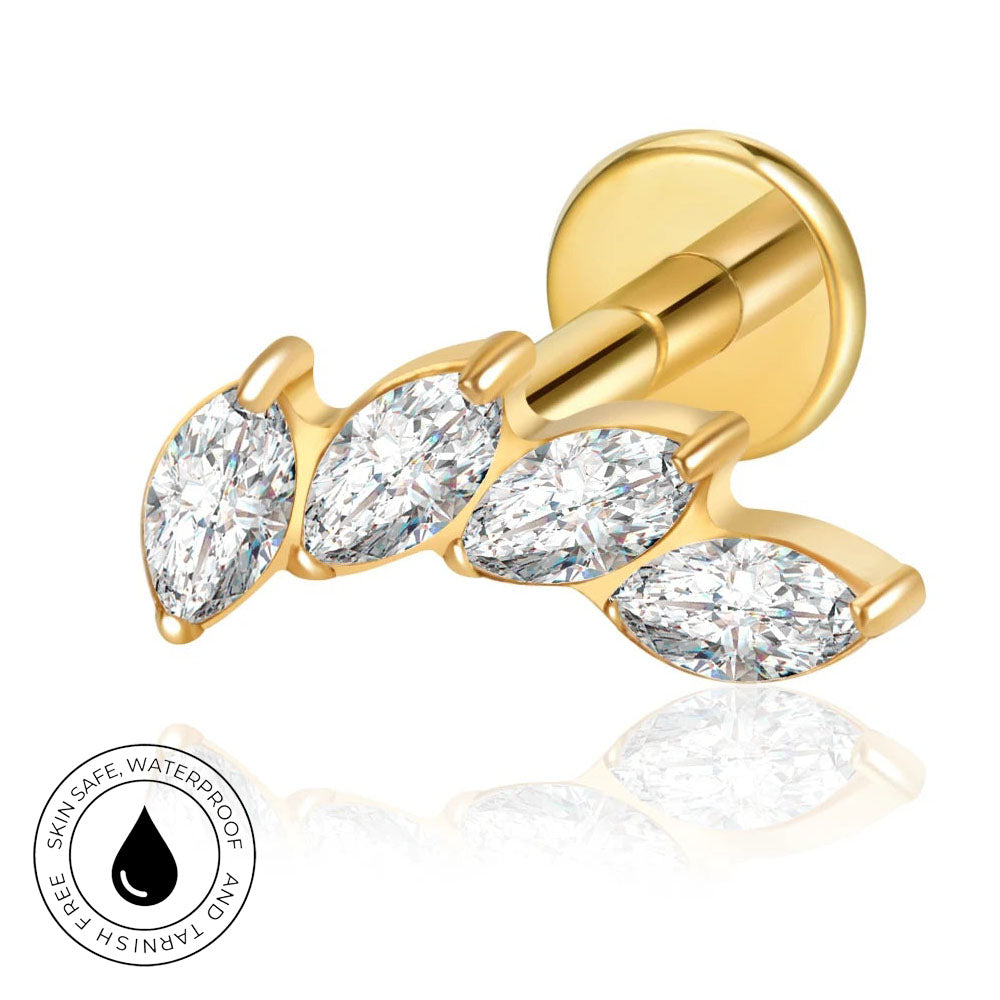 A gold-plated ear cuff featuring four marquise-cut clear crystals set in a curved row, shown on a white background with a reflection and a circular 'SkinSafe Waterproof' badge.