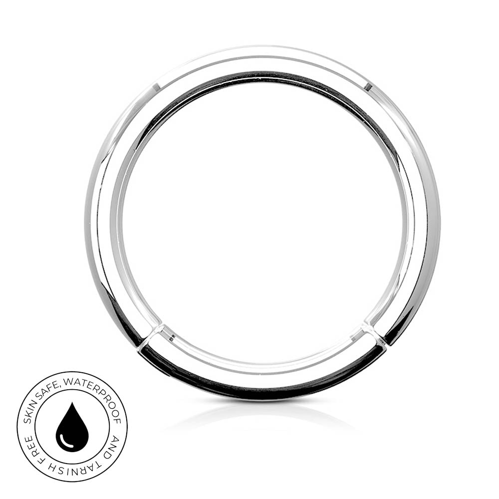 A polished silver-tone circular ring with a small clip or connector at the bottom, shown on a white background with a small circular 'skin-safe waterproof' badge in the lower left.