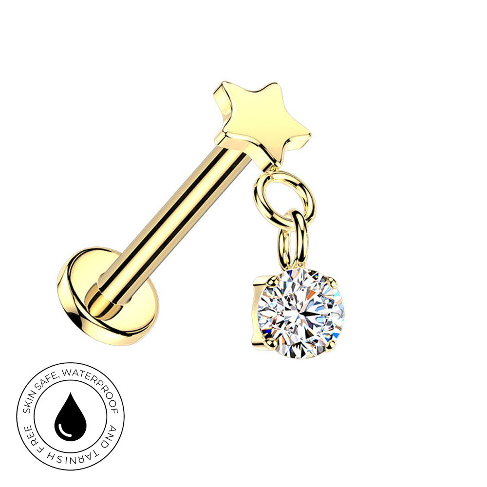 A gold-plated barbell stud piercing with a star-shaped top and a dangling round clear gemstone charm, shown on a plain white background with a small 'skin-safe waterproof' badge in the lower-left corner.