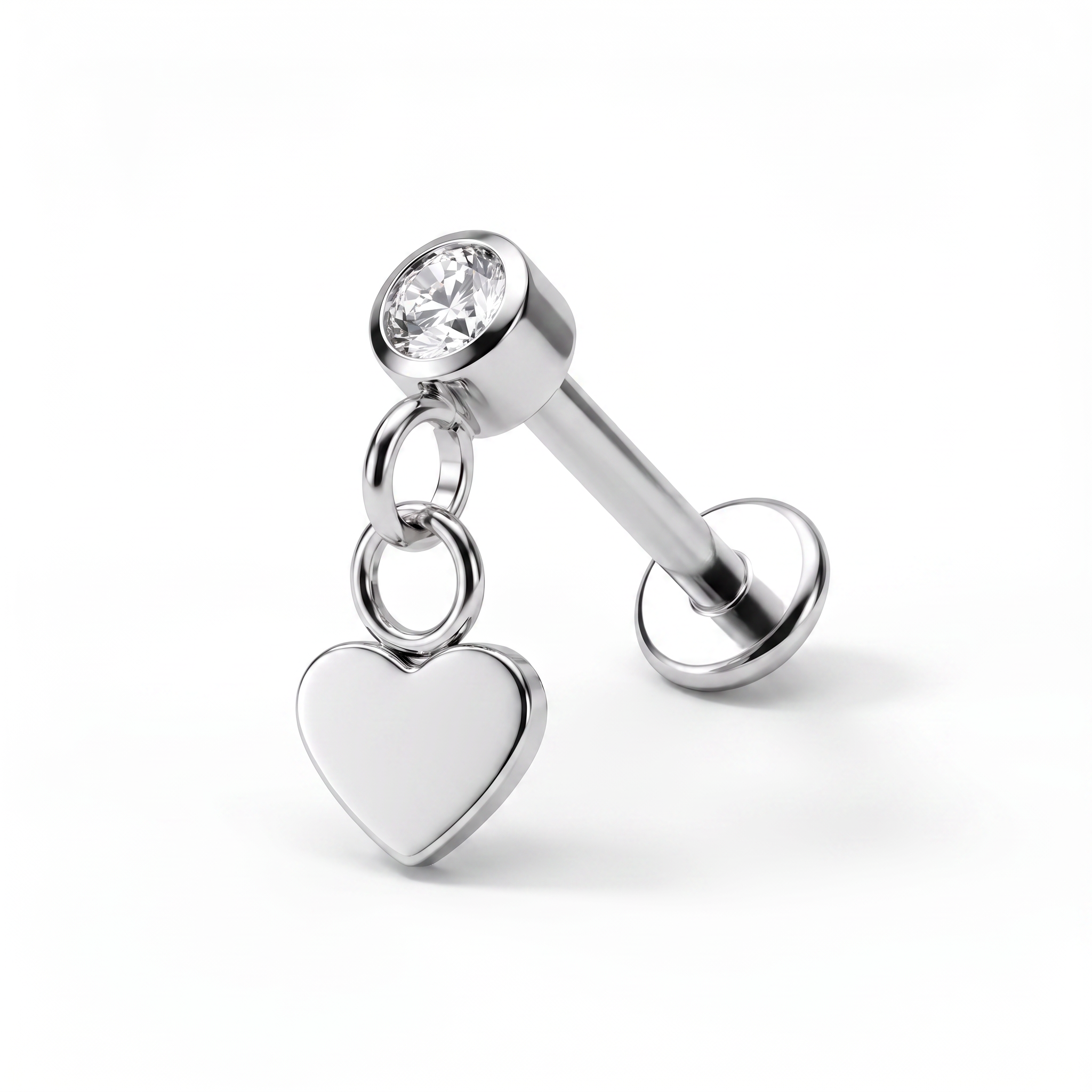 A silver-toned barbell piercing stud with a clear round gemstone and a dangling heart charm, shown on a clean white background.