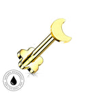 Gold-plated barbell piercing stud with a crescent moon top and a four-petal flower bottom, shown on a white background with a circular 'Skin Safe Waterproof' badge.