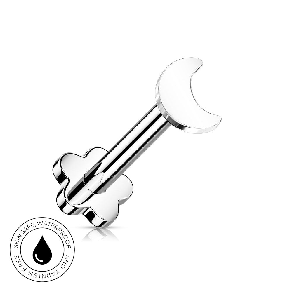 A polished stainless steel curved barbell piercing stud with a crescent moon on one end and a four-petal flower on the other, shown on a white background with a circular 'Skin Safe Waterproof' badge in the lower-left corner.