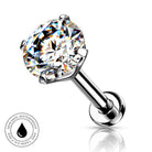 A silver-toned labret piercing barbell with a large round brilliant-cut clear gemstone in a prong setting, shown on a white background with a reflection below and a small circular 'Skin Safe Waterproof' badge in the lower left.
