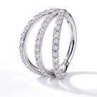 A silver-toned triple-band hoop ring set with clear round-cut gemstones, photographed on a clean white background with a soft shadow.