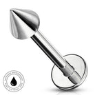 A stainless steel curved barbell piercing stud with a flared disc end and a tapered spike tip, shown on a white background with a circular 'SkinSafe Waterproof' badge in the lower-left corner.