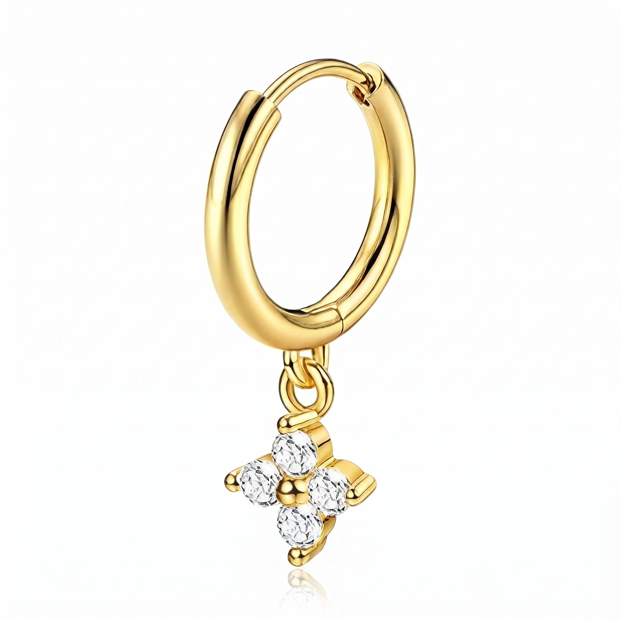 A gold hoop earring with a dangling flower charm set with clear gemstones, shown on a clean white background with a subtle reflection.