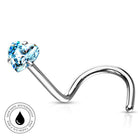 A curved silver-toned nose ring with a faceted light blue heart-shaped gemstone, shown on a clean white background with a small circular 'skin-safe waterproof' badge in the lower left.