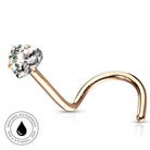 A curved rose gold nose ring with a heart-shaped clear gemstone, shown on a white background with a circular 'Skin Safe Waterproof' badge in the lower-left corner.