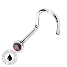 A curved silver-toned labret piercing barbell with a faceted dark pink gemstone, shown on a plain white background with a circular 'Skin Safe Waterproof' badge in the lower-left corner.
