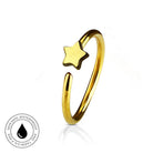 A gold-plated open bangle ring with a small five-pointed star charm, shown on a white background with a reflection. A circular 'Skin Safe Waterproof' logo is visible in the bottom-left corner.