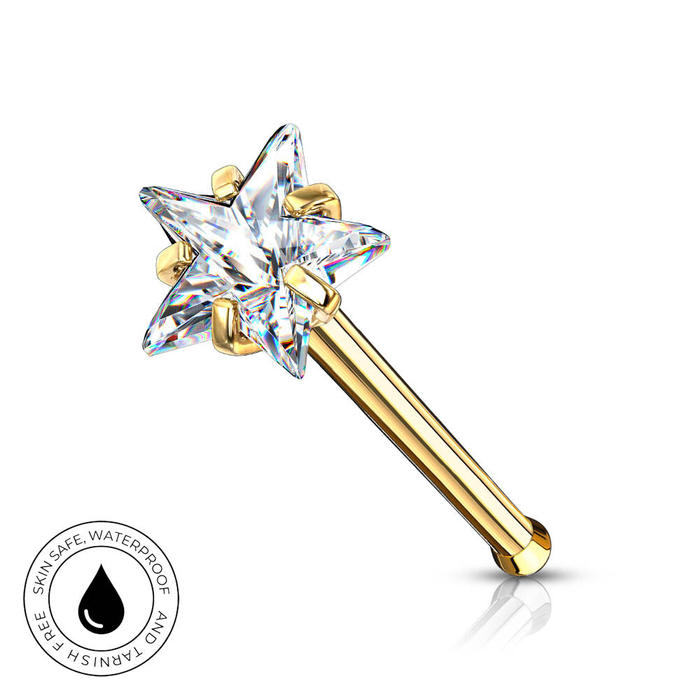 Gold star-shaped nose stud with a clear faceted crystal gemstone, shown on a white background with a circular 'Skin Safe Waterproof' badge in the lower-left corner.
