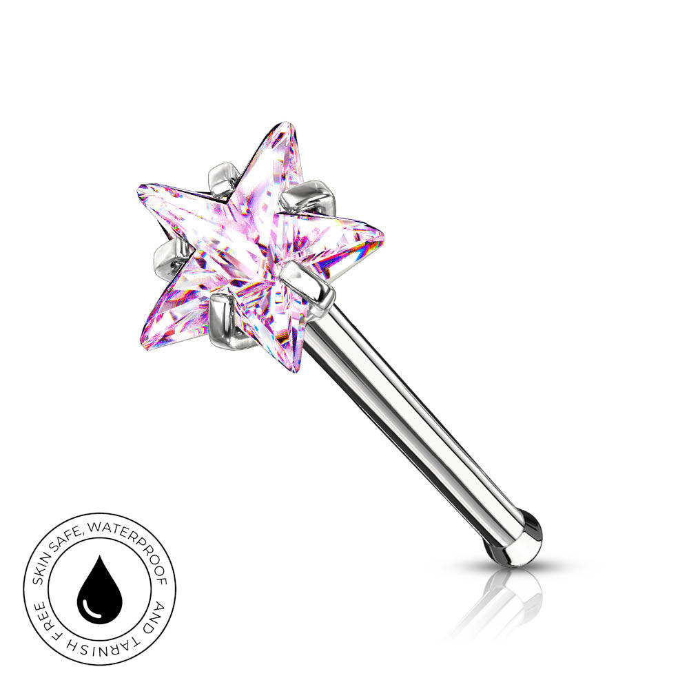 A silver-toned labret piercing barbell featuring a faceted five-point star crystal with pink and purple iridescent tones, shown on a white background with a small circular 'SkinSafe Waterproof' badge in the lower left.