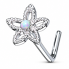 A silver-toned flower-shaped ring with a central iridescent opal gemstone and clear crystal accents, shown on a plain white background.