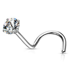 A curved barbell nose ring featuring a single round-cut clear gemstone in a prong setting on a polished silver-tone metal band, shown against a plain white background.