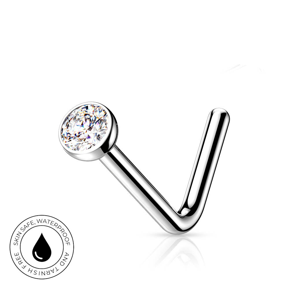 A silver-toned curved barbell piercing stud with a clear round gemstone, shown on a white background with a small circular 'skin-safe waterproof' badge in the lower left corner.