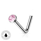 A silver-toned curved barbell nose ring with a round pink gemstone, shown on a white background with a small 'skin-safe waterproof' badge in the lower left corner.