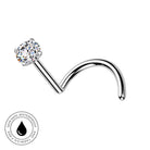 A curved barbell nose stud with a round clear gemstone in a four-prong setting, finished in polished silver-tone metal. A circular badge in the bottom-left corner reads 'SKINSAFE WATERPROOF' with a water droplet icon.