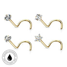 Four gold nose studs arranged in a 2x2 grid on a white background, each with a clear gemstone set in a different shape: round, square, heart, and star. A circular badge in the lower left reads 'Skin Safe Waterproof' with a black droplet icon.