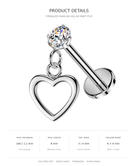 Threadless hollow heart stud piercing jewelry shown on a white background with product details text and measurements below. The piece has a polished silver-tone post, a dangling open heart charm, and a clear faceted crystal top.