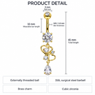 Product detail diagram for a gold-tone belly button ring with heart and teardrop charms, showing measurements including 41 mm total length, 10 mm wearable bar length, 3 mm ball end, 14G/1.6 mm bar thickness, and material labels for brass charm, cubic zirconia, and 316L steel.