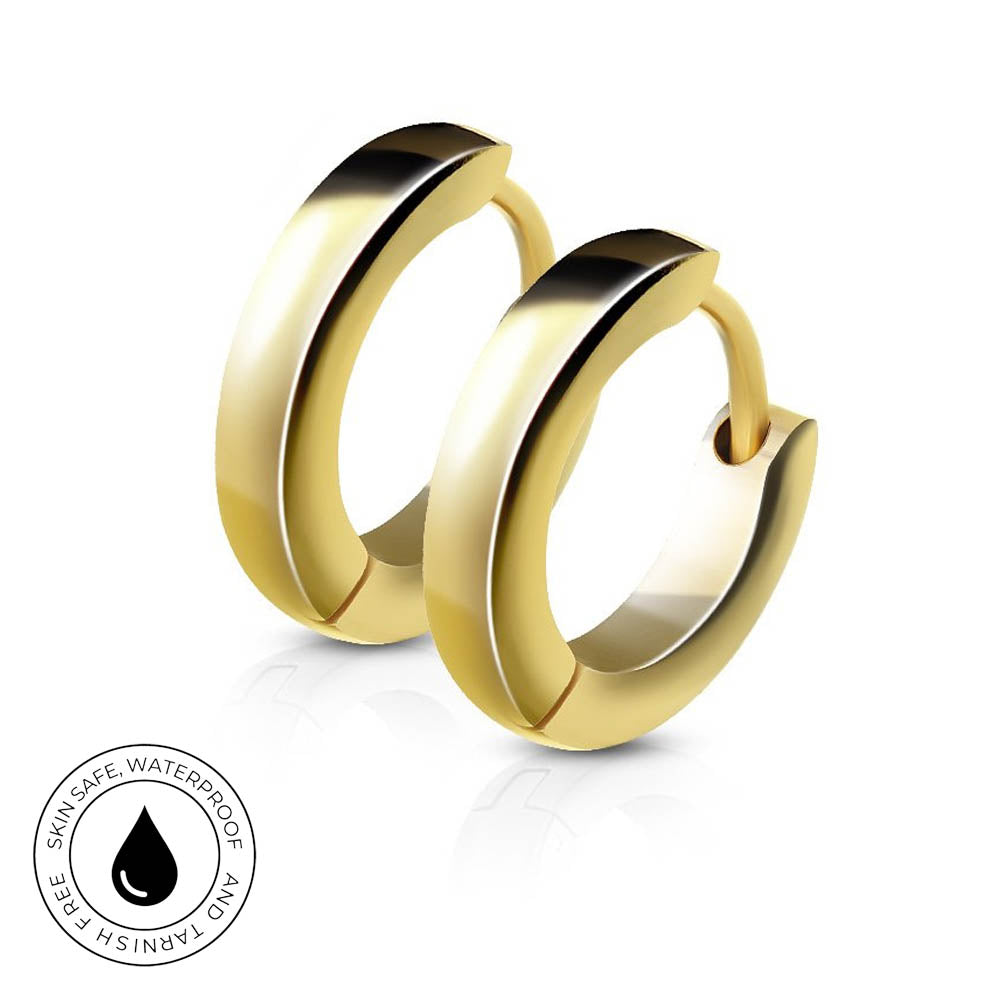 A pair of polished gold huggie hoop earrings on a white background with a circular 'Skin Safe Waterproof' badge in the bottom-left corner.