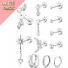 A 12-piece silver stud and hoop jewelry set displayed on a white background with a pink diagonal banner in the top-left corner reading 'MULTI PACK'. The set includes various floral, celestial, and geometric stud earrings as well as three hoop styles, all featuring clear rhinestones and cubic zirconia accents.