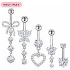 A 5-piece multi-pack of silver-toned belly button rings decorated with clear rhinestones in various shapes including a bow, butterfly, heart, and floral clusters, shown on a white background with a pink 'MULTI PACK' label.