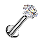 A silver-toned labret piercing stud with a large, clear, faceted cushion-cut gemstone on a plain white background.
