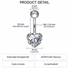 Product detail diagram of a curved barbell belly button ring with a heart-shaped cubic zirconia crystal, showing measurements: 5 mm ball end, 10 mm wearable bar length, 14G/1.6 mm bar thickness, 8 mm crystal size, and material/finish notes for ASTM F136 Titanium and Cubic zirconia.