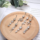 Multi Pack Of 7 Dangling Belly Button Bars