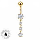 Gold-plated belly button ring with a vertical drop design featuring four clear round-cut cubic zirconia stones, shown on a white background with a skin-safe waterproof badge in the bottom-left corner.