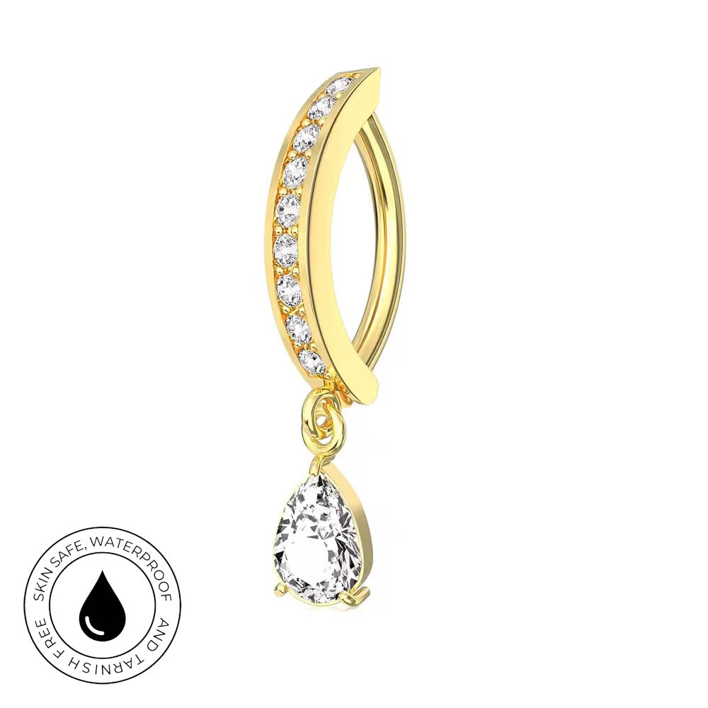Gold huggie hoop piercing with clear cubic zirconia stones and a dangling teardrop clear stone, shown on a white background with a skin-safe waterproof badge.