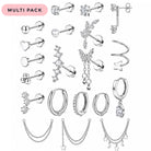 A 20-piece silver-toned ear cuff and stud jewelry set displayed on a clean white background. The set includes various hoop, huggie, stud, and chain earrings with clear crystal and pearl accents, along with three silver chain necklaces featuring star, crescent moon, and starburst charms.