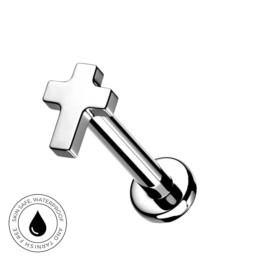 A silver-toned stainless steel labret piercing stud with a cross-shaped top and a round flat-back post, shown on a plain white background with a circular 'Skin Safe Waterproof' badge in the lower-left corner.